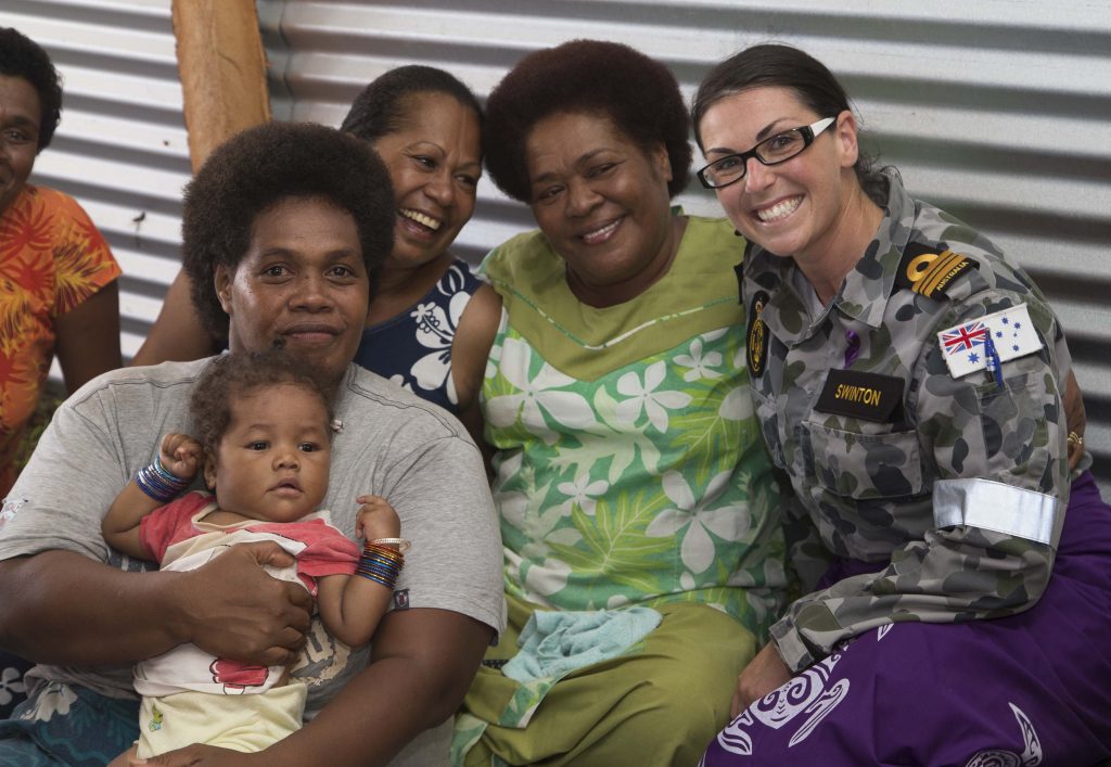 Women from Vuna Village meeting Lieutenant Commander Jacqueline Swinton 