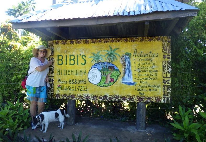 Guest and Dog at the entrance of Bibi's Hideaway Resort - Taveuni Accommodations