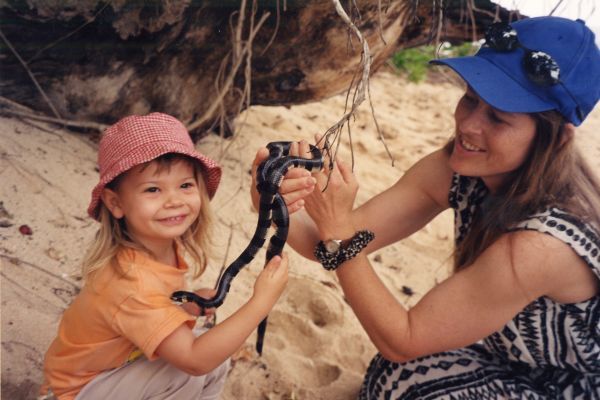 Mother and Daughter on Beach with Reptile - Health Tips